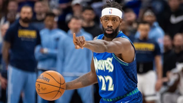 Minnesota Timberwolves guard Patrick Beverley (22) signals his team against the Memphis Grizzlies in the third quarter during game one of the three round for the 2022 NBA playoffs.
